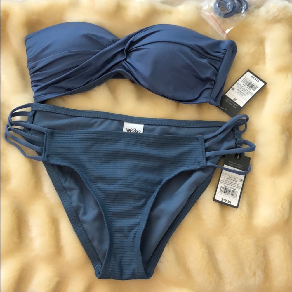 Blue bathing suit. Can be bought separately